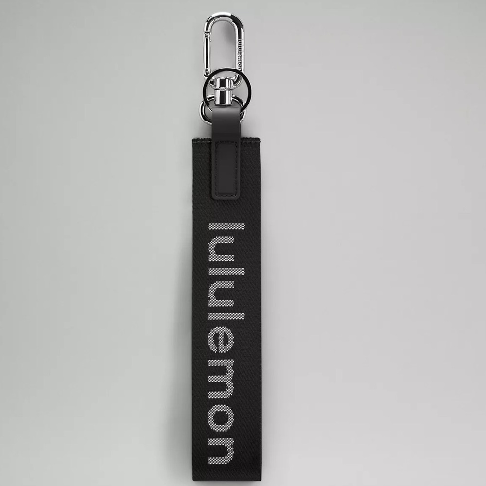 Lululemon never lost key chain NWT